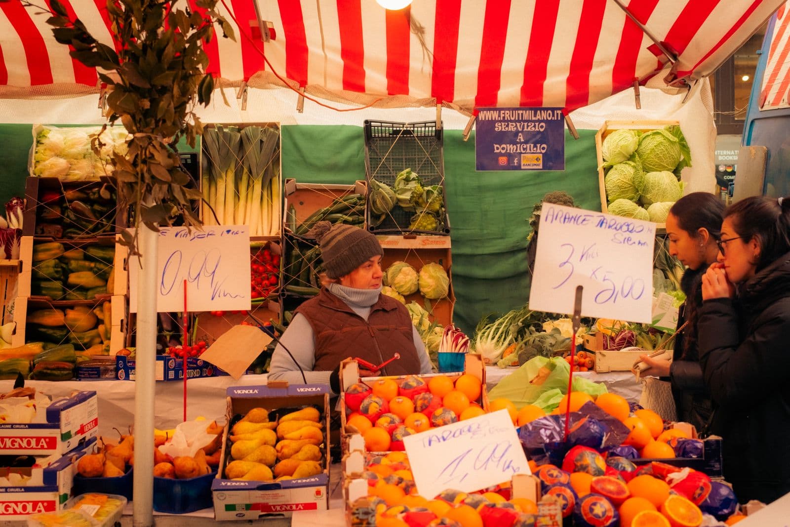 A colourful fresh-produce market stall, representative of the guided food-market tour format