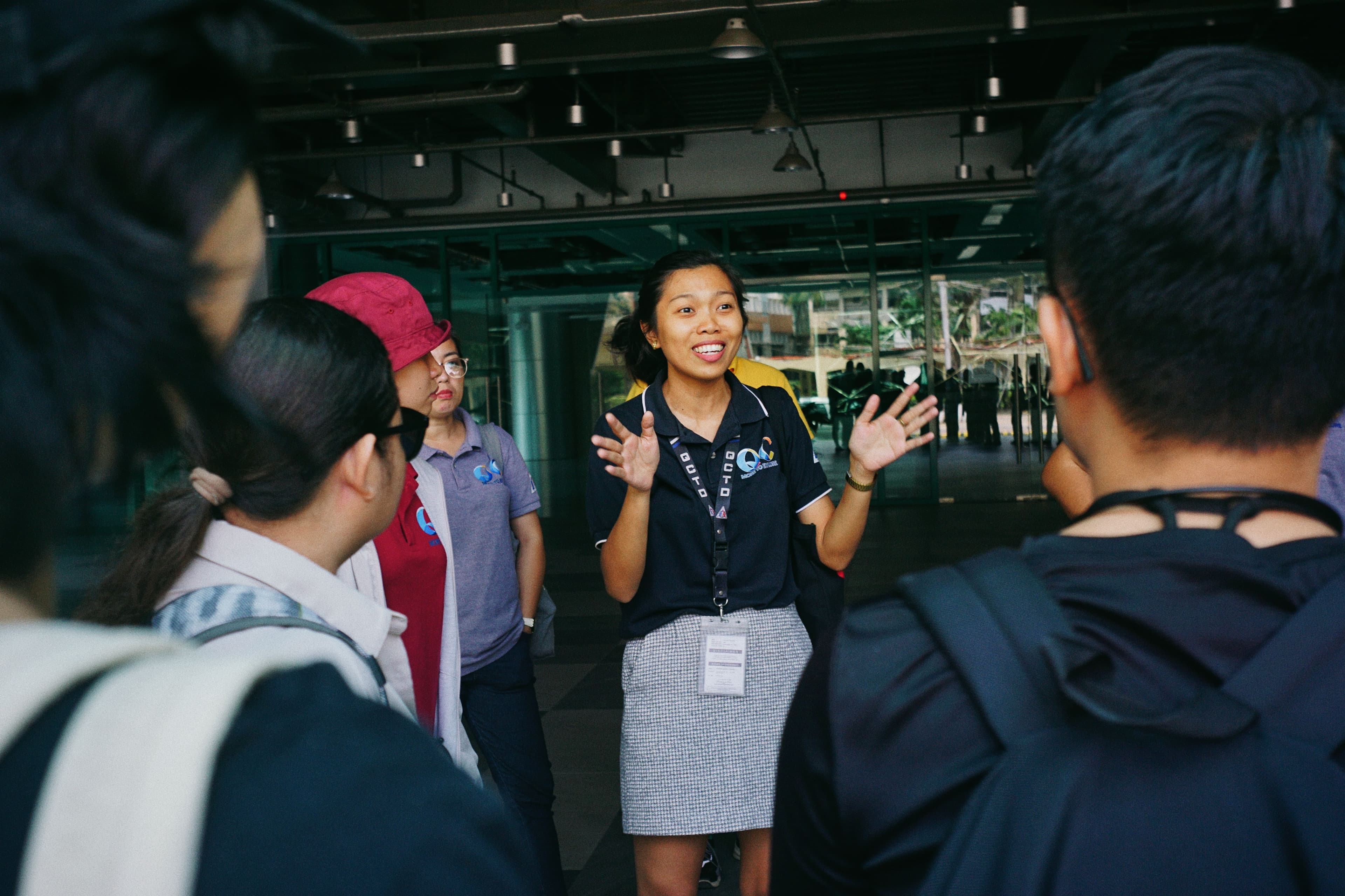 A guide leading a small group of visitors on an outdoor city tour